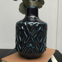 Petit vase en céramique bleue